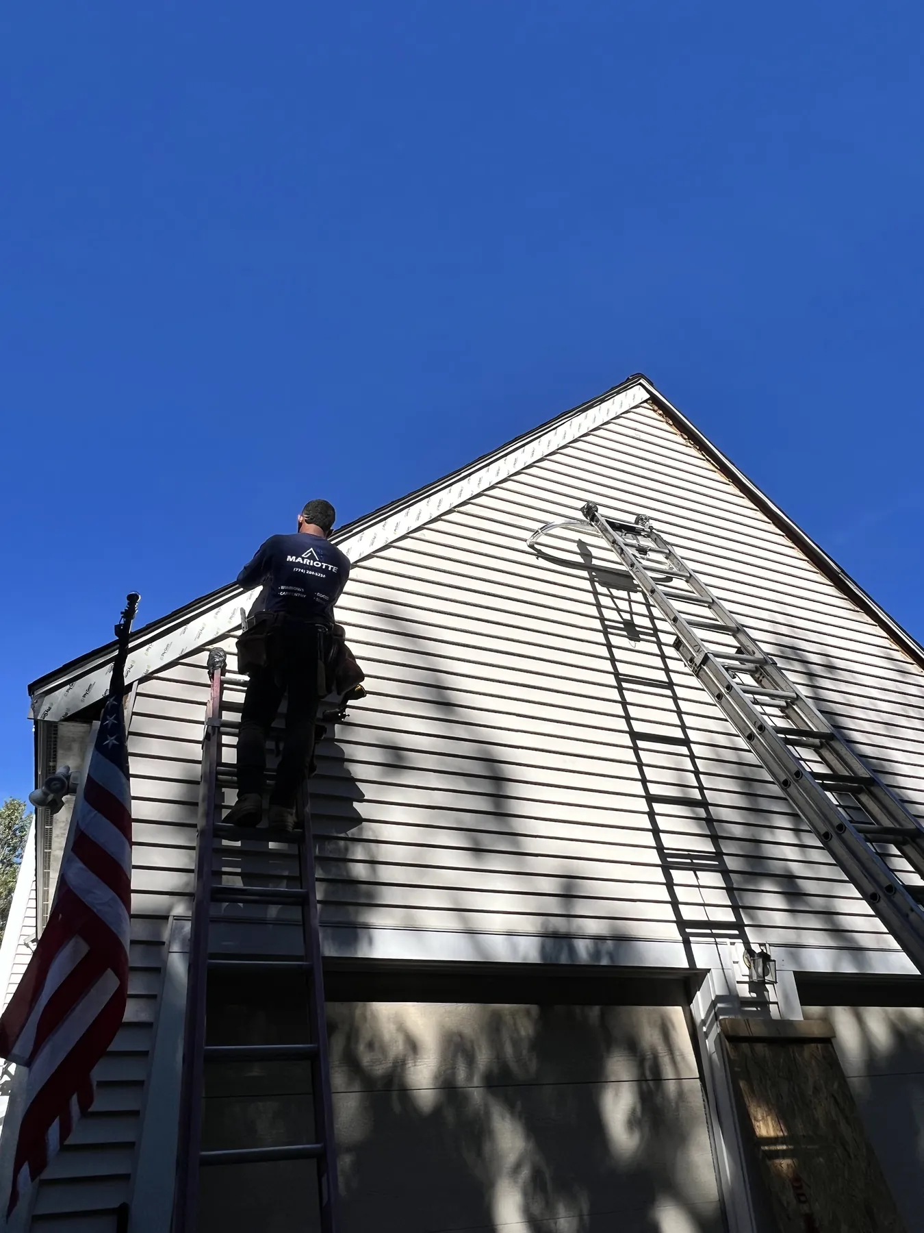 Mariotte carpenter working on a gable end