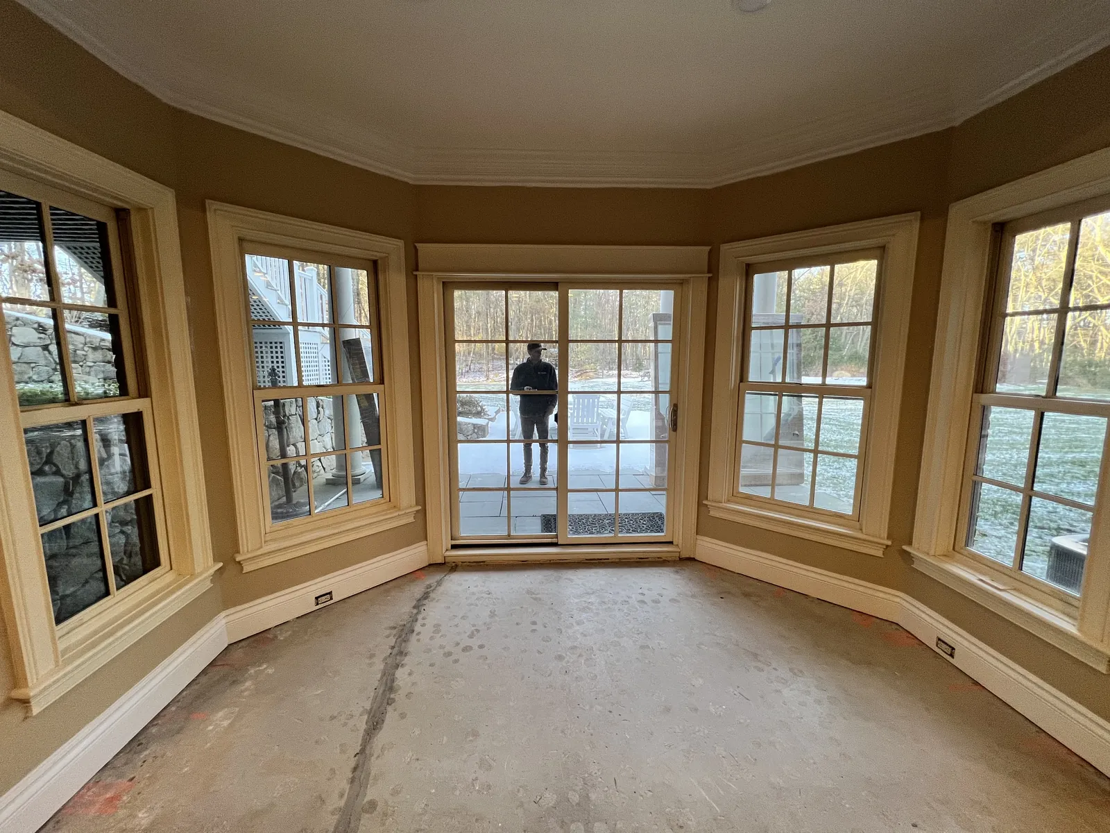 Curved bay window wall in a renovated living room